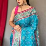 Whimsical Rama Patola Silk Saree with Amazing Blouse Piece