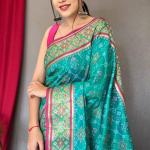 Serendipity Turquoise Patola Silk Saree with Luxuriant Blouse Piece