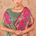 Vivacious Dark Pink Patola Silk Saree with Hypnotic Blouse Piece