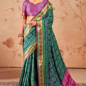 Murmurous Green Patola Silk Saree with Sophisticated Blouse Piece