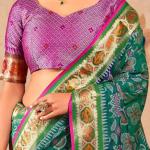 Murmurous Green Patola Silk Saree with Sophisticated Blouse Piece