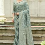 Twirling Sea Green Lucknowi Silk Saree With Outstanding Blouse Piece