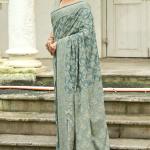 Twirling Sea Green Lucknowi Silk Saree With Outstanding Blouse Piece