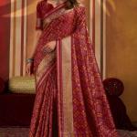 Staring Maroon Patola Silk Saree with Precious Blouse Piece