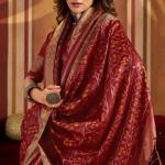 Staring Maroon Patola Silk Saree with Precious Blouse Piece