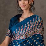Sumptuous Rama Ajrakh Printed Semi Modal Silk Saree With Staggering Blouse Piece