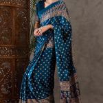 Sumptuous Rama Ajrakh Printed Semi Modal Silk Saree With Staggering Blouse Piece
