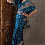 Sumptuous Rama Ajrakh Printed Semi Modal Silk Saree With Staggering Blouse Piece