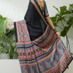 Seraphic Black Ajrakh Printed Semi Modal Silk Saree With Flattering Blouse Piece