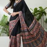 Seraphic Black Ajrakh Printed Semi Modal Silk Saree With Flattering Blouse Piece