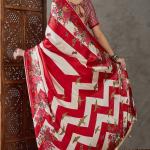 Pretty Red Ajrakh Printed Semi Modal Silk Saree With Impressive Blouse Piece
