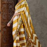 Super extravagant Mustard Ajrakh Printed Semi Modal Silk Saree With Demesne Blouse Piece
