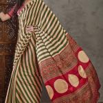 Surreptitious Green Ajrakh Printed Semi Modal Silk Saree With Pleasant Blouse Piece
