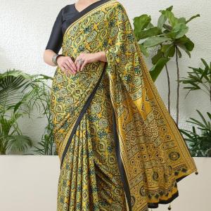 Mesmeric Yellow Ajrakh Printed Semi Modal Silk Saree With Rhapsody Blouse Piece
