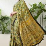 Mesmeric Yellow Ajrakh Printed Semi Modal Silk Saree With Rhapsody Blouse Piece