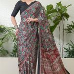 Enthralling Maroon Ajrakh Printed Semi Modal Silk Saree With Demesne Blouse Piece