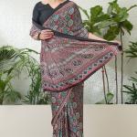 Enthralling Maroon Ajrakh Printed Semi Modal Silk Saree With Demesne Blouse Piece