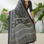 Efflorescence Black Ajrakh Printed Semi Modal Silk Saree With Angelic Blouse Piece