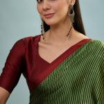 Transcendent Dark Green Ajrakh Printed Semi Modal Silk Saree With Winsome Blouse Piece
