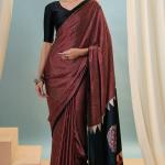 Enthralling Maroon Ajrakh Printed Semi Modal Silk Saree With Desuetude Blouse Piece
