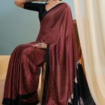 Enthralling Maroon Ajrakh Printed Semi Modal Silk Saree With Desuetude Blouse Piece