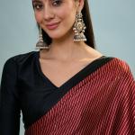 Enthralling Maroon Ajrakh Printed Semi Modal Silk Saree With Desuetude Blouse Piece