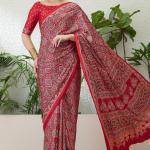 Exuberant Maroon Ajrakh Printed Semi Modal Silk Saree With Glittering Blouse Piece