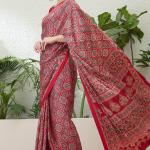 Exuberant Maroon Ajrakh Printed Semi Modal Silk Saree With Glittering Blouse Piece