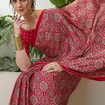 Exuberant Maroon Ajrakh Printed Semi Modal Silk Saree With Glittering Blouse Piece