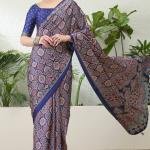 Sumptuous Navy Blue Ajrakh Printed Semi Modal Silk Saree With Stunning Blouse Piece