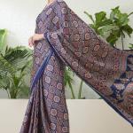 Sumptuous Navy Blue Ajrakh Printed Semi Modal Silk Saree With Stunning Blouse Piece
