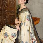Pulsating Off White Ajrakh Printed Semi Modal Silk Saree With Forbearance Blouse Piece