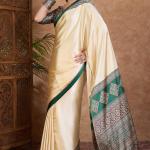 Redolent Off White Ajrakh Printed Semi Modal Silk Saree With Gleaming Blouse Piece