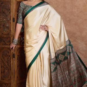 Redolent Off White Ajrakh Printed Semi Modal Silk Saree With Gleaming Blouse Piece