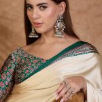 Redolent Off White Ajrakh Printed Semi Modal Silk Saree With Gleaming Blouse Piece