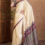 Twirling Off White Ajrakh Printed Semi Modal Silk Saree With Piquant Blouse Piece