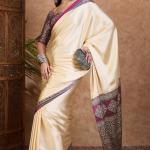 Twirling Off White Ajrakh Printed Semi Modal Silk Saree With Piquant Blouse Piece