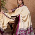 Twirling Off White Ajrakh Printed Semi Modal Silk Saree With Piquant Blouse Piece