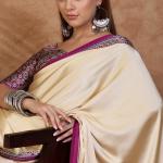 Twirling Off White Ajrakh Printed Semi Modal Silk Saree With Piquant Blouse Piece