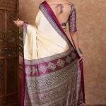Twirling Off White Ajrakh Printed Semi Modal Silk Saree With Piquant Blouse Piece