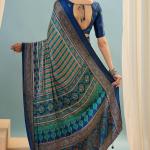 Sonorous Dark Green Ajrakh Printed Semi Modal Silk Saree With Breathtaking Blouse Piece