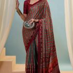 Enigmatic Red Ajrakh Printed Semi Modal Silk Saree With Blissful Blouse Piece