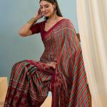 Enigmatic Red Ajrakh Printed Semi Modal Silk Saree With Blissful Blouse Piece