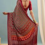 Enigmatic Red Ajrakh Printed Semi Modal Silk Saree With Blissful Blouse Piece