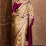 Pleasurable Beige Ajrakh Printed Semi Modal Silk Saree With Profuse Blouse Piece
