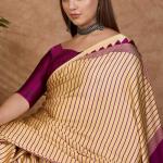 Pleasurable Beige Ajrakh Printed Semi Modal Silk Saree With Profuse Blouse Piece
