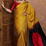 Sensational Yellow Ajrakh Printed Semi Modal Silk Saree With Resonant Blouse Piece