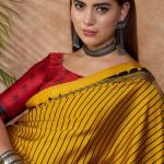 Sensational Yellow Ajrakh Printed Semi Modal Silk Saree With Resonant Blouse Piece