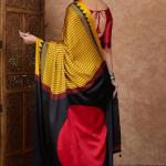 Sensational Yellow Ajrakh Printed Semi Modal Silk Saree With Resonant Blouse Piece