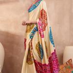Glowing Beige Ajrakh Printed Semi Modal Silk Saree With Breathtaking Blouse Piece